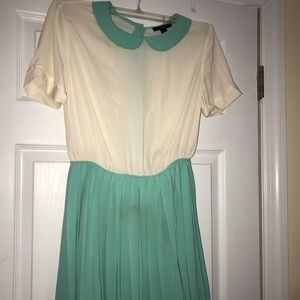 Vintage style dress with pleated aqua-blue bottom